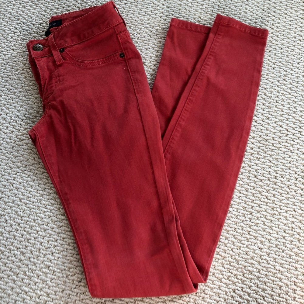 BEBE ORANGE SKINNY JEANS SIZE 25